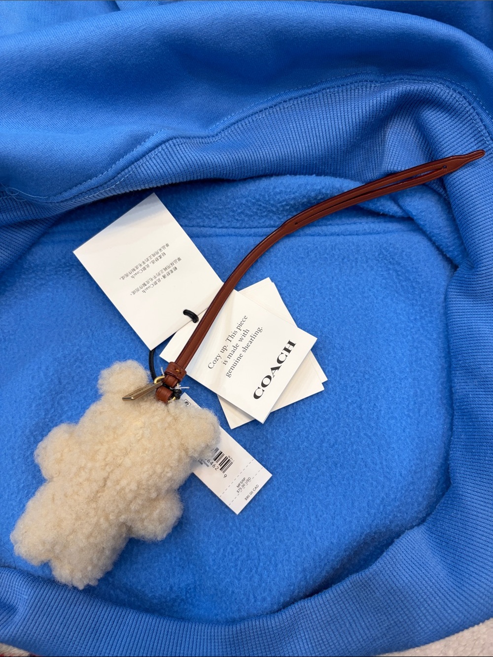 COACH Cream Shearling Bear Bag Charm with Brown Leather Strap